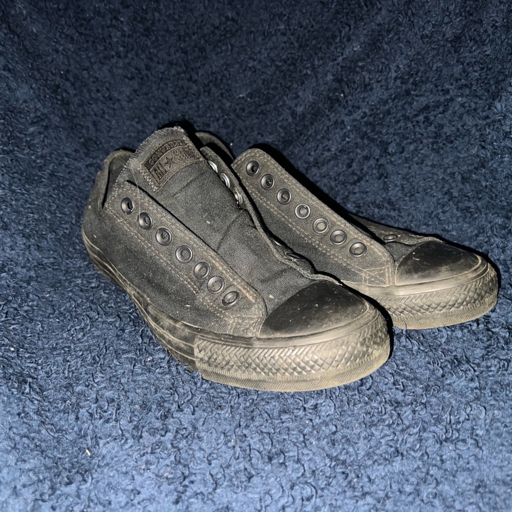 Converse all black lows, used, a little scratched up, no laces